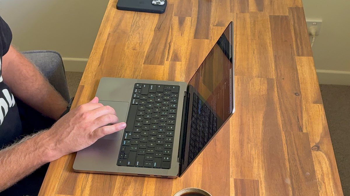 Damian working at his desk